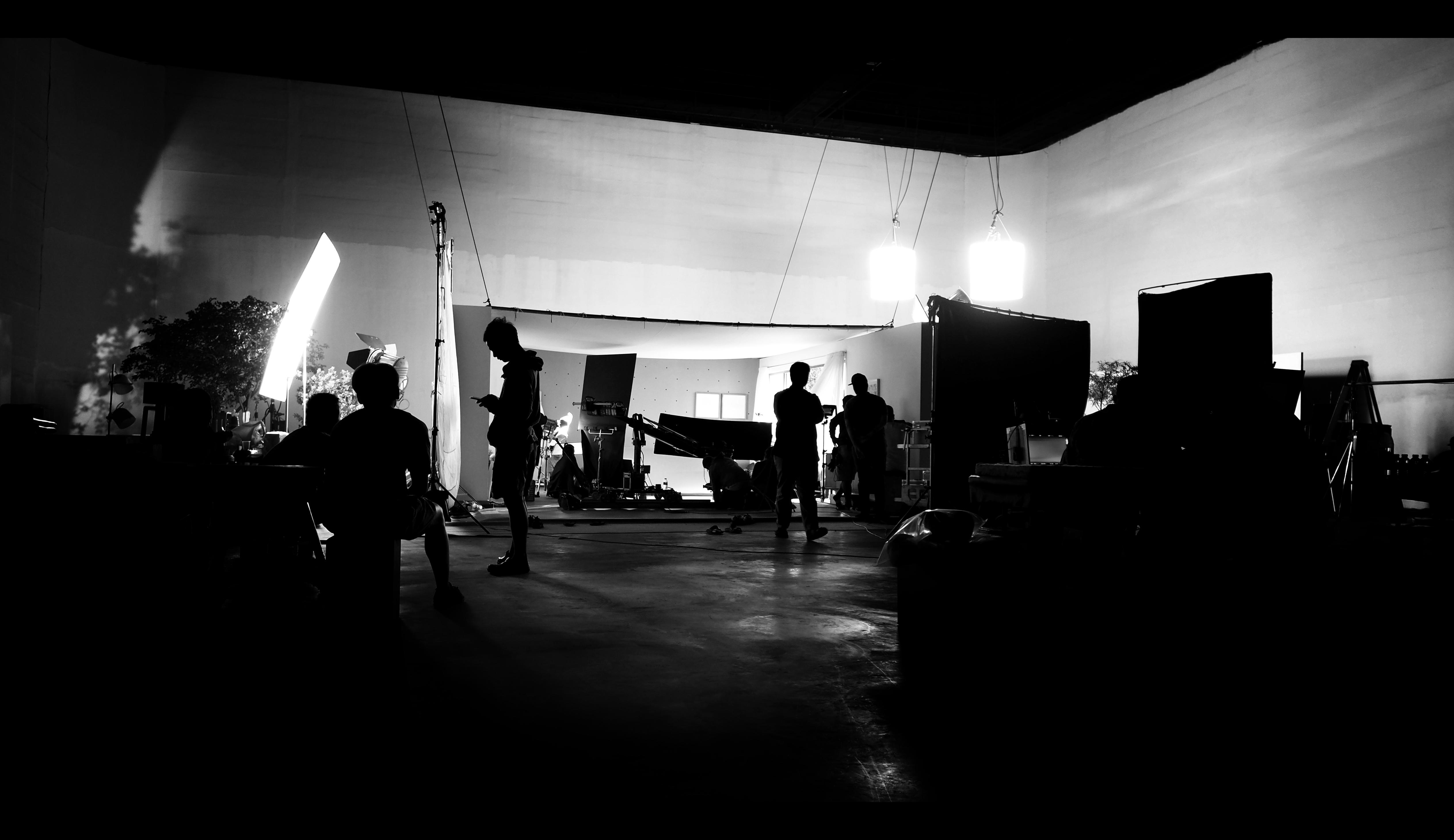 Silhoutte images of video production and lighting
